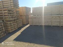 Деревянные опоры, бревна оцилиндрованые