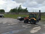 Экскаватор-погрузчик  Mecalac tlb 870 - fotosurat 1