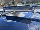 Nissan Navara 2.5 dCi Platinum Pickup 4dr Diesel Manual 4WD Euro 5 - fotosurat 2