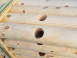 Оцилиндрованный брус, деревянные опоры, колья - fotosurat 3