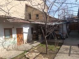 Участок земли с домом